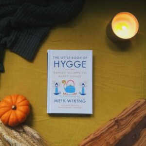 Hygge is a Danish word that is loosely translated as “coziness”. Think about quiet winter days with snowfall outside the window, books, hot tea, and lit candles and you’ll be on the right track. Meik Wiking’s book posits that one of the reasons the Danes are consistently the happiest people in the world is the way they embrace coziness. My husband read this book right after me and we immediately started implementing hygge practices in our home. It’s brought us closer as a family, brought us closer to nature, and made us more patient and nurturing parents.