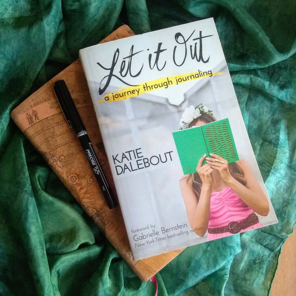 I have always been a huge fan of journaling. Rather, I’ve been a huge fan of collecting pretty journals that sit, mostly empty, on my shelf because they’re meant for a particular subject. It takes a long time to fill up a “business journal” and a “gratitude journal” and a “clinic journal” plus every other type of journal you could conceive of. So when I heard Katie Dalebout’s podcast on Being Boss I was naturally intrigued. I think what convinced me to buy the book was when she talked about her journal collection. At one point, Dalebout had the same problem I had. Tons of journals with tons of empty pages. But because of how Dalebout breaks down her journaling “tools”, empty pages become less of a problem. Partially because it stops mattering what you put in what journal. In fact, for some tools she recommends nothing fancy at all and uses a legal pad. Some tools aren’t even in journals at all, but rather in a phone or a jar (no, really.) By the end of the podcast episode I knew what I wanted for my birthday – I wanted to get Let it Out and start using up my journals. But in the meantime, I needed to find out who Katie Dalebout was and what she was all about.