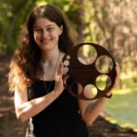 Image of Jessica holding a wooden cervical dilation visual aid. Jessica Gustafson is a licensed acupuncturist in St Paul, MN specializing in women’s health and fertility. She loves working with patients through the Health Foundations Birth Center on Grand Avenue in St Paul and doing home visits in the Twin Cities area. Check out the services page for more information! Follow Reverie Acupuncture on Facebook, Pinterest and Instagram for updates! Please follow and like Reverie Acupuncture!